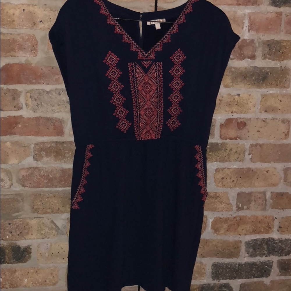 Navy sundress with coral stitching